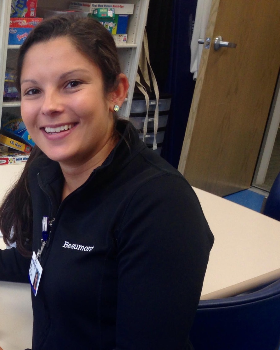 Julie Marcel, founder of Chief Complaint Collective, at her clinical workspace